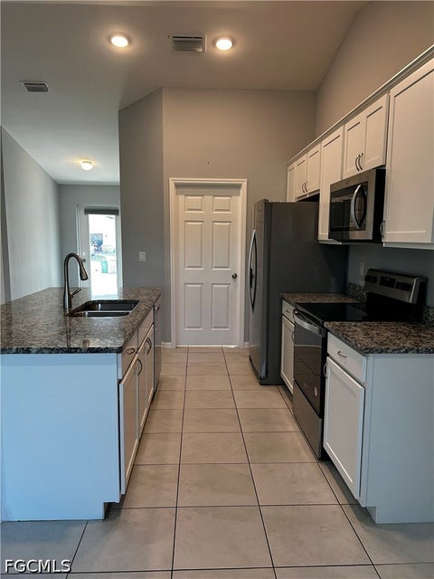 Tiny photo for 1011 NW 22nd Terrace, Cape Coral, FL 33993 (MLS # 2026039462)