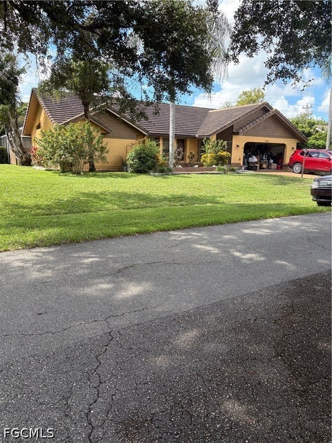 Photo of 688 Morningmist Lane, Lehigh Acres, FL 33974 (MLS # 2026039426)