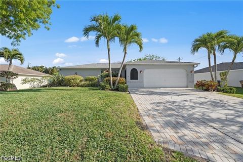 Photo of 311 SW 19th Lane, Cape Coral, FL 33991 (MLS # 2026019873)
