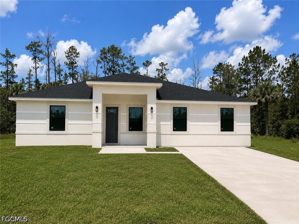 Photo 1 of 20 — 666 Topeka Court, Lehigh Acres, FL 33972