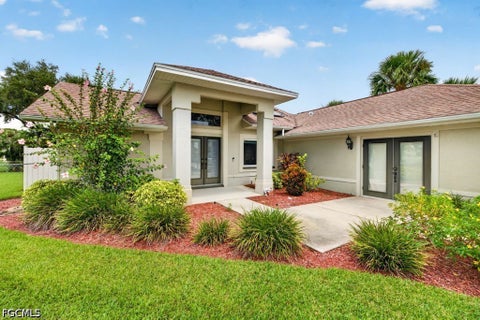 Photo of 2610 Elva Place, Lehigh Acres, FL 33971 (MLS # 2026036964)
