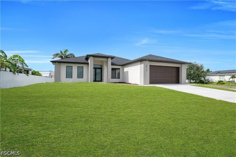 Photo of 3916 8th Street SW, Lehigh Acres, FL 33976 (MLS # 2026030975)