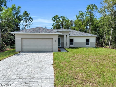 Photo of 626 Dauphine Avenue S, Lehigh Acres, FL 33974 (MLS # 2026040419)
