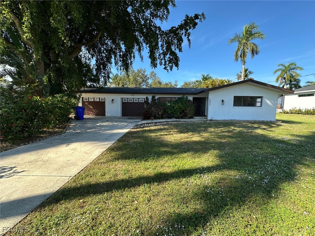 Photo 1 of 18 — 3933 E River Drive, Fort Myers, FL 33916