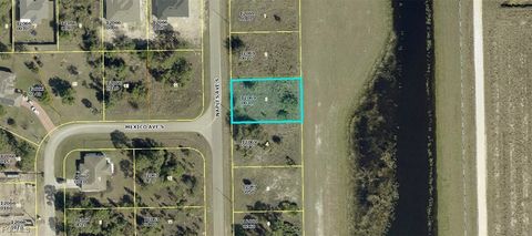 Photo of 1005 Naples Avenue S, Lehigh Acres, FL 33974 (MLS # 2025016973) Photo of 1005 Naples Avenue S, Lehigh Acres, FL 33974 (MLS # 2025016973)