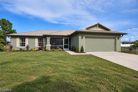 Photo of 2407 Claude Avenue N, Lehigh Acres, FL 33971 (MLS # 2026039414)