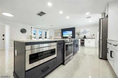 Tiny photo for 2107 SE 25th Terrace, Cape Coral, FL 33904 (MLS # 2026018618)