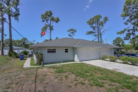 Photo of 1104-1106 Circle Drive, Lehigh Acres, FL 33973 (MLS # 2026019929)