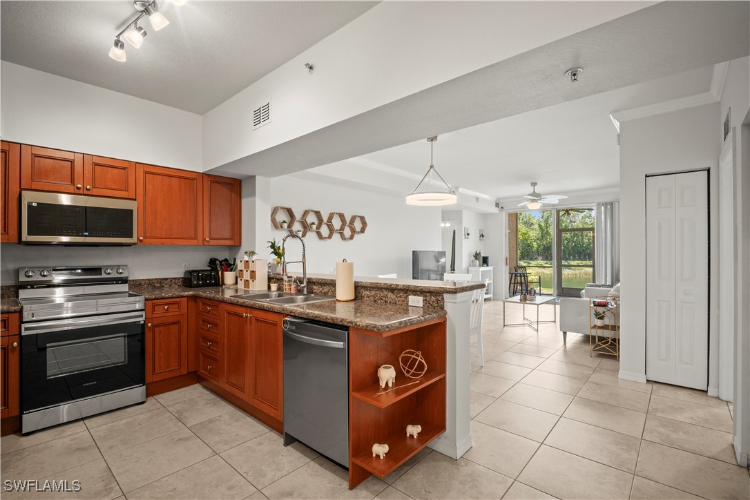 10121 Villagio Palms Way 102