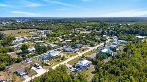 Tiny photo for 5866 Tahiti Drive, Bokeelia, FL 33922 (MLS # 2026018149)