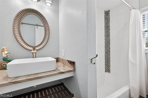 Tiny photo for 5866 Tahiti Drive, Bokeelia, FL 33922 (MLS # 2026018149)