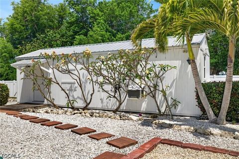 Tiny photo for 5866 Tahiti Drive, Bokeelia, FL 33922 (MLS # 2026018149)