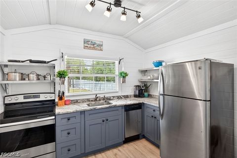 Tiny photo for 5866 Tahiti Drive, Bokeelia, FL 33922 (MLS # 2026018149)