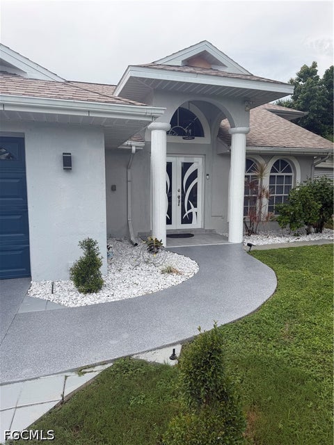 Photo of 401 HIBISCUS Avenue, Lehigh Acres, FL 33972 (MLS # 2026042151)