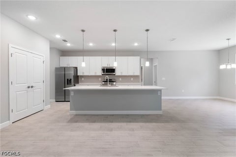 Tiny photo for 13 SW 34th Place, Cape Coral, FL 33991 (MLS # 2026043243)
