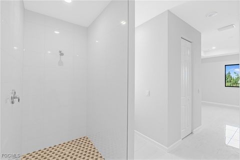 Tiny photo for 3340 NE 19th Avenue, Cape Coral, FL 33909 (MLS # 2025008622)