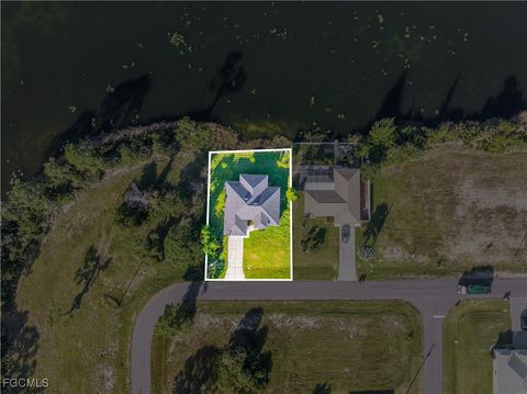 Tiny photo for 3340 NE 19th Avenue, Cape Coral, FL 33909 (MLS # 2025008622)