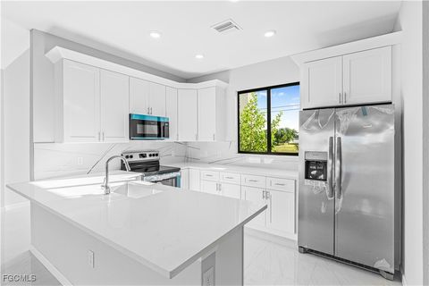 Tiny photo for 3340 NE 19th Avenue, Cape Coral, FL 33909 (MLS # 2025008622)