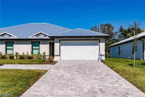 Photo of 925 SE 14th Street, Cape Coral, FL 33990 (MLS # 2026014341)