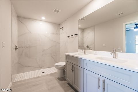 Tiny photo for 925 SE 14th Street, Cape Coral, FL 33990 (MLS # 2026014341)