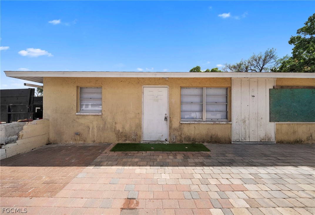 View of front of property featuring a patio area a