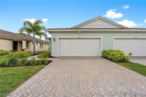 Photo of 10355 Bonavie Cove Drive, Fort Myers, FL 33966 (MLS # 2026018526)