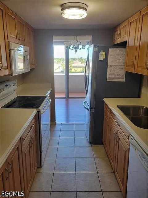 Photo of 4803 Sunset Court #402, Cape Coral, FL 33904 (MLS # 2026020267)