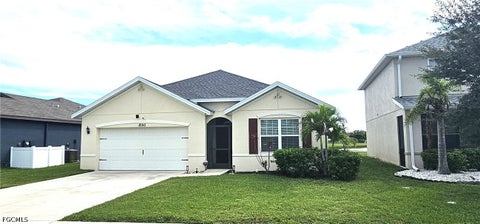 Photo of 8150 Gopher Tortoise Trail, Lehigh Acres, FL 33972 (MLS # 2026040931)