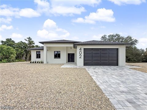 Photo of 402 Thompson Avenue, Lehigh Acres, FL 33972 (MLS # 2026020008)