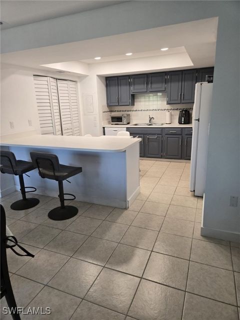 Tiny photo for 12922 Cherrydale Court, Fort Myers, FL 33919 (MLS # 225056130)