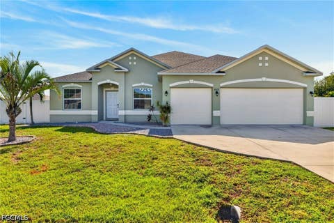 Photo of 1623 SW 19th Place, Cape Coral, FL 33991 (MLS # 2026034756)