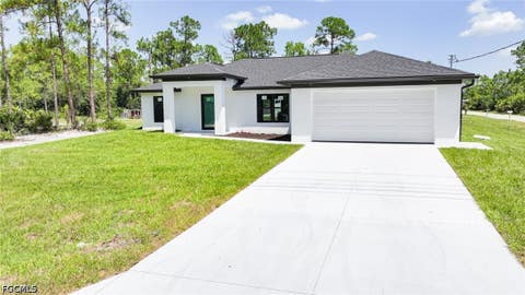 Photo of 1407 E 15th Street, Lehigh Acres, FL 33972 (MLS # 2026035455)