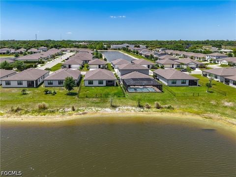 Photo of 16056 Enclaves Cove Drive, North Fort Myers, FL 33917 (MLS # 2026018899)