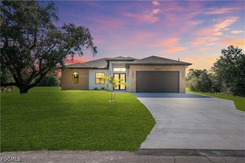 Photo of 1717 Roosevelt Avenue, Lehigh Acres, FL 33972 (MLS # 2026035776)