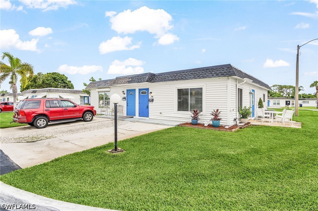 Photo 1 of 29 — 34 Hamlin Court, Lehigh Acres, FL 33936