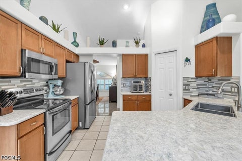 Tiny photo for 1021 NW 25th Avenue, Cape Coral, FL 33993 (MLS # 2026039128)