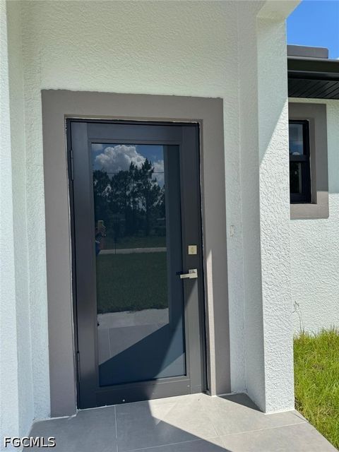 Tiny photo for 2206 Hogan Drive, Lehigh Acres, FL 33973 (MLS # 2026023233)