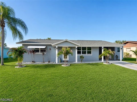 Photo of 1314 Farmdale Street, Lehigh Acres, FL 33936 (MLS # 2026035820)