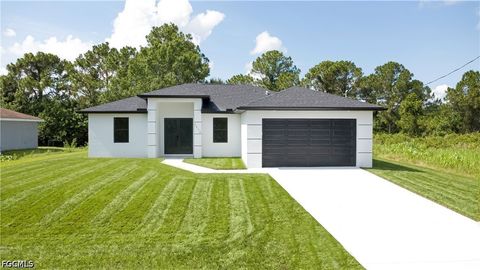 Photo of 3213 51st Street W, Lehigh Acres, FL 33971 (MLS # 2026026759)