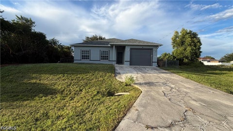 Photo of 3202 10th Street SW, Lehigh Acres, FL 33976 (MLS # 2026039565)
