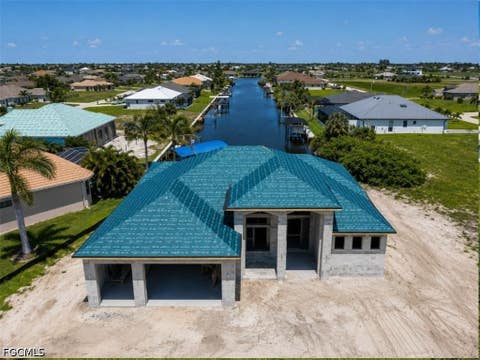 Photo of 3231 Yucatan Parkway, Cape Coral, FL 33993 (MLS # 2026034519)