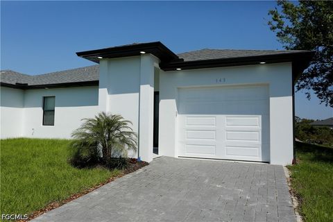 Photo of 143 Harold Avenue S, Lehigh Acres, FL 33973 (MLS # 2026015242)