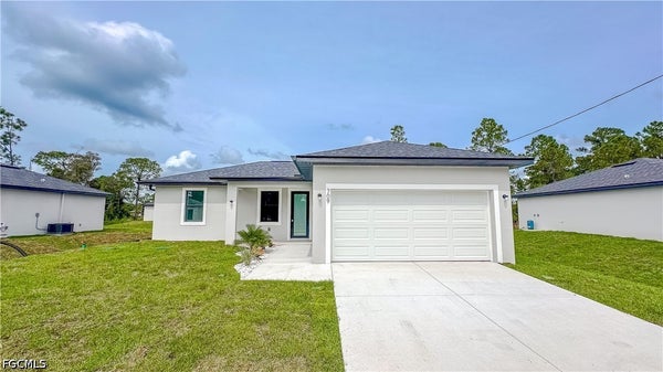709 AVONDALE ST E, LEHIGH ACRES, FL 33974 - Image c9cc377b2ac2bf4120d9fc18dae06d18/1607197860