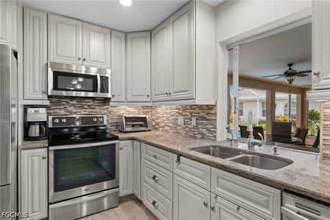 Tiny photo for 403 SE 28th Terrace, Cape Coral, FL 33904 (MLS # 2026039106)