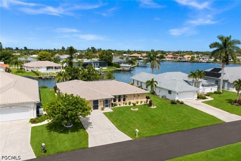 Photo of 403 SE 28th Terrace, Cape Coral, FL 33904 (MLS # 2026039106)