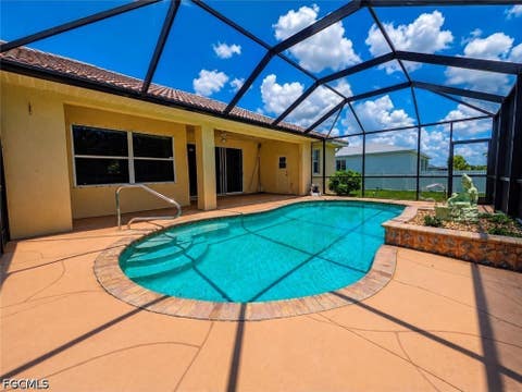 Photo of 2110 Embers Parkway W, Cape Coral, FL 33993 (MLS # 2026035002)