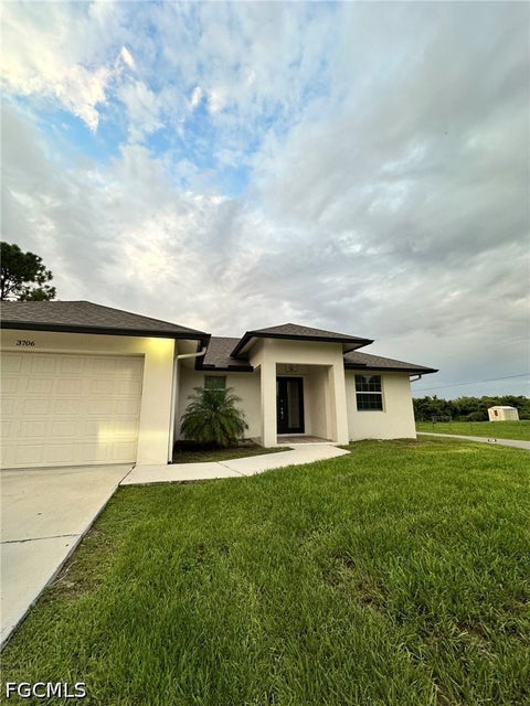 Photo of 3706 7th Street SW, Lehigh Acres, FL 33976 (MLS # 2026043235)