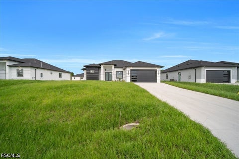 Photo of 3621 5th Street SW, Lehigh Acres, FL 33976 (MLS # 2026042313)