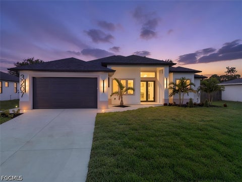 Photo of 3207 11th Street W, Lehigh Acres, FL 33971 (MLS # 2026041218)
