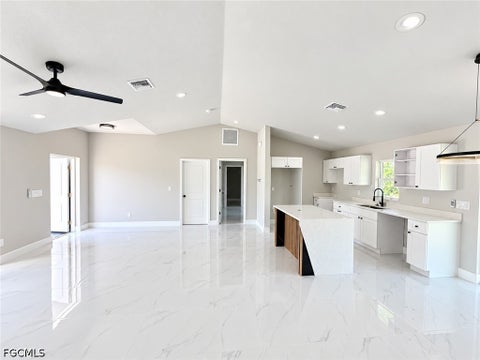 Tiny photo for 2409 NE 19th Avenue, Cape Coral, FL 33909 (MLS # 2026039549)